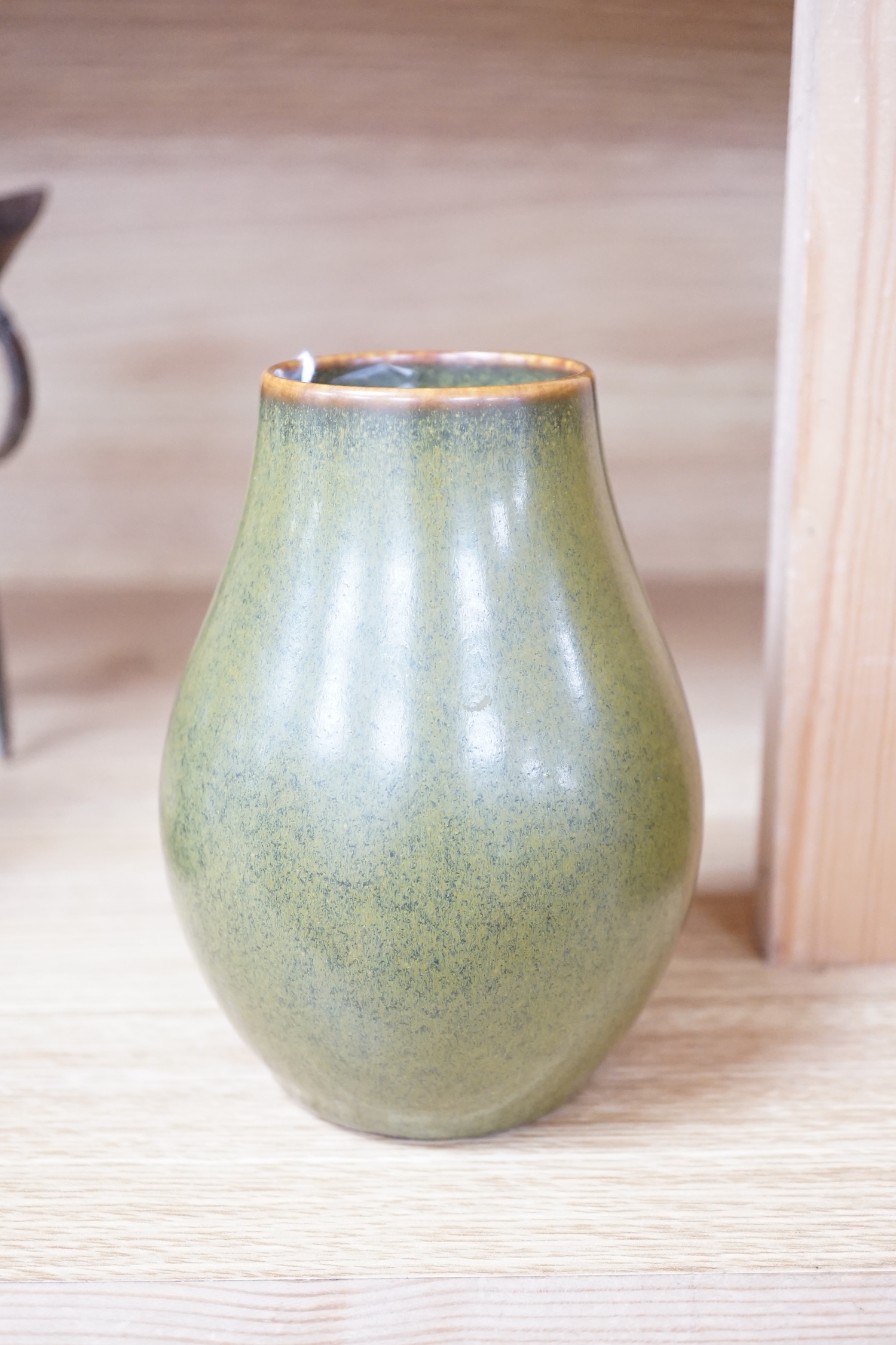 A Chinese tea dust glazed pear-shaped vase, 14cm high